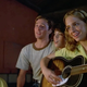 campers singing before Mrs. Voorhees kills them all.